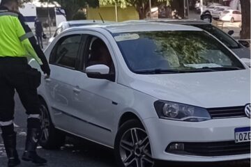 Passageira flagrada levando criança no colo. Foto: DFT